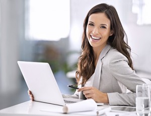 Shot of an attractive businesswoman sitting at her desk in an office